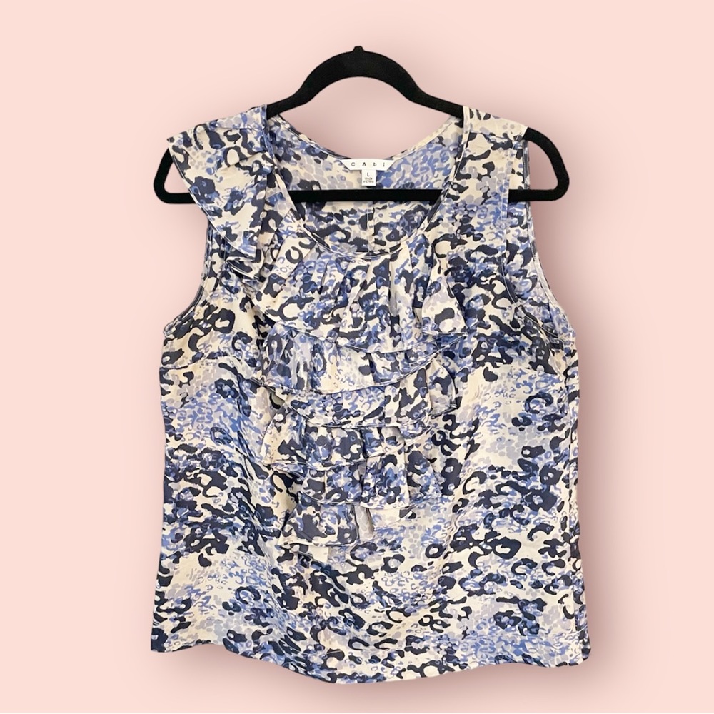 #628 - CAbi Cascading Ruffle Blouse - Women’s Sleeveless Blue Leopard Print Top